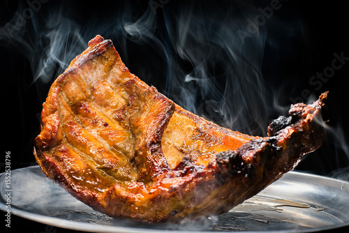 Freshly baked pork ribs with a smoky flavor.