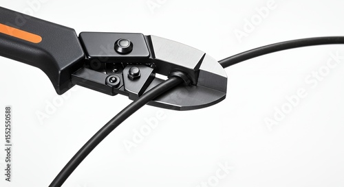 Cable cutter cutting black cable close up
