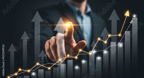 Businessman touching a rising graph with glowing arrow. Concept of financial growth, success, and business analytics.

