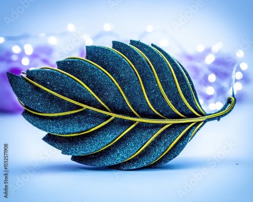 Detailed close-up of a decorative leaf brooch