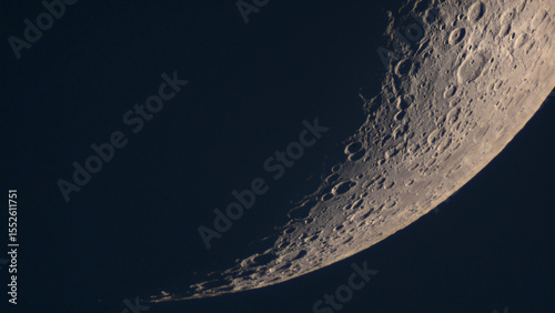 Detailed view shows rugged lunar terminator crater rim. Close-Up of the Moon's Terminator Line with Craters