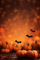 Halloween background with pumpkins and bats, spooky atmosphere, copy space concept. Halloween night banner template design with Halloween pumpkin and bat on orange bokeh lights