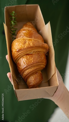 Fresh croissant bakery: delicious pastry in box