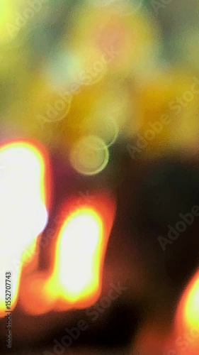 Blurred defocused. Traditional Hindu fire ceremony with sacred statues, Hindu festival vertical video, spiritual vertical background.