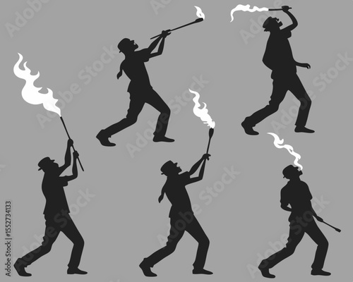 Silhouette of Fire Jugglers Performing