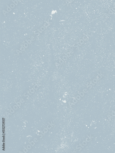 The image showcases a soft, light blue backdrop speckled with subtle white imperfections, creating depth and texture. Its gentle palette creates a serene atmosphere.