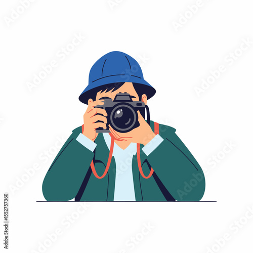 Man wearing a blue hat and green jacket taking a photo with a vintage camera