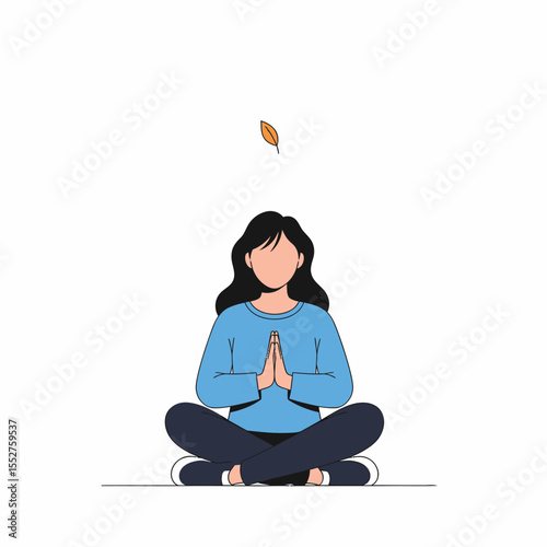 Woman meditating in a peaceful lotus position with hands pressed together in prayer