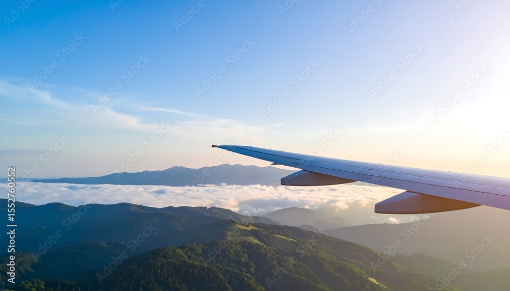 Fototapeta premium Airplane wing view over mountain landscape.