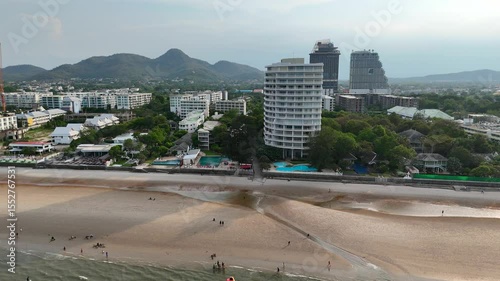 Beachfront buildings and palm tree landscape