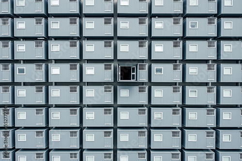 Repetitive modular container architecture with one open unit
