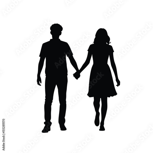 Silhouette of a young couple holding hands and walking together leisurely