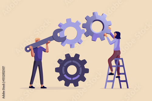 Two people working together to assemble gears with a wrench and ladder