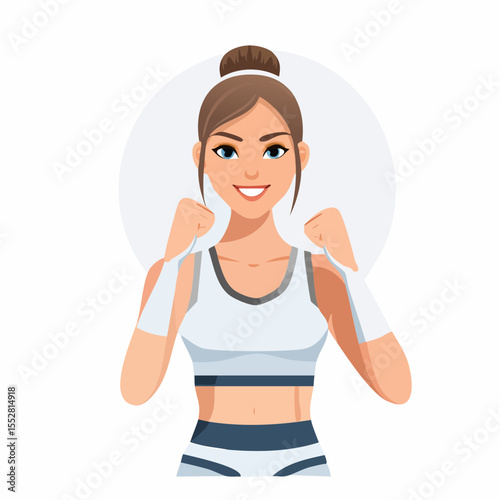 Smiling woman in athletic wear, fists raised in a confident pose.