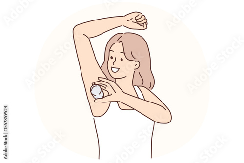 Woman raising hand using deodorant during morning hygiene routine to avoid sweat and odor