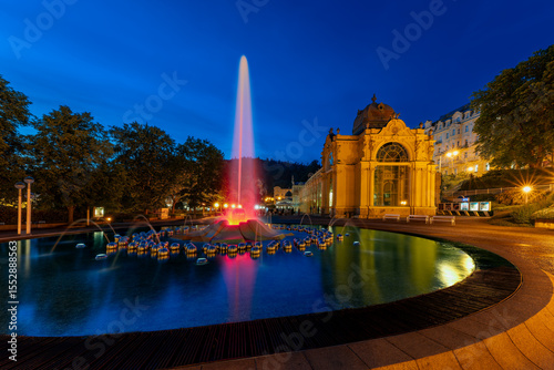 Marianske Lazne (Marienbad) - Main colonnade and singing fountain at night - center of great famous Bohemian spa town in the west part of the Czech Republic (region Karlovy Vary)	