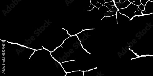 A high-contrast, black and white abstract image showing white cracks spreading from the left and right corners towards an empty black space in the center. 