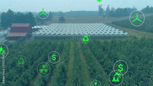 Drone approaching greenhouse revealing energy icons orbiting and fading out to show sustainability