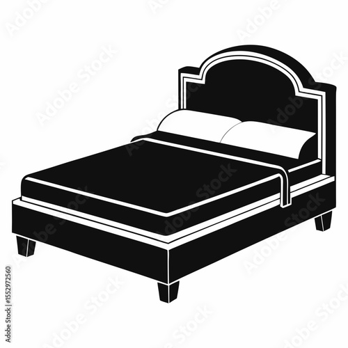 Elegant Black and White Bed with Pillows and Decorative Headboard