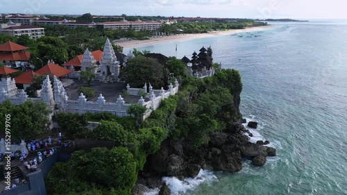 Aerial view of Hindu temple at Indian Ocean coastline of beautiful island of gods.Nusa Dua.Bali.Indonesia