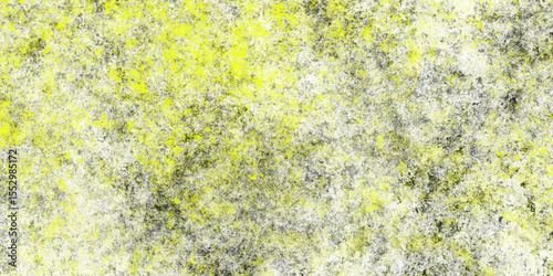 green grass background. Scattered grunge texture yellow color cement plaster wall surface. Dark grunge texture on bright yellow concrete wall