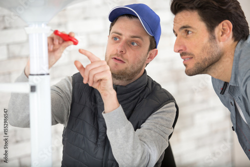 worker with apprentice