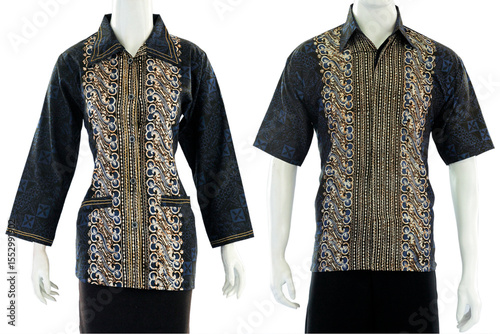 Batik couple outfit in black with a blouse cut for women and short sleeve shirts for men.