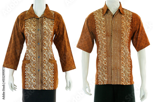 Batik couple outfit in brown with a blouse cut for women and short sleeve shirts for men.