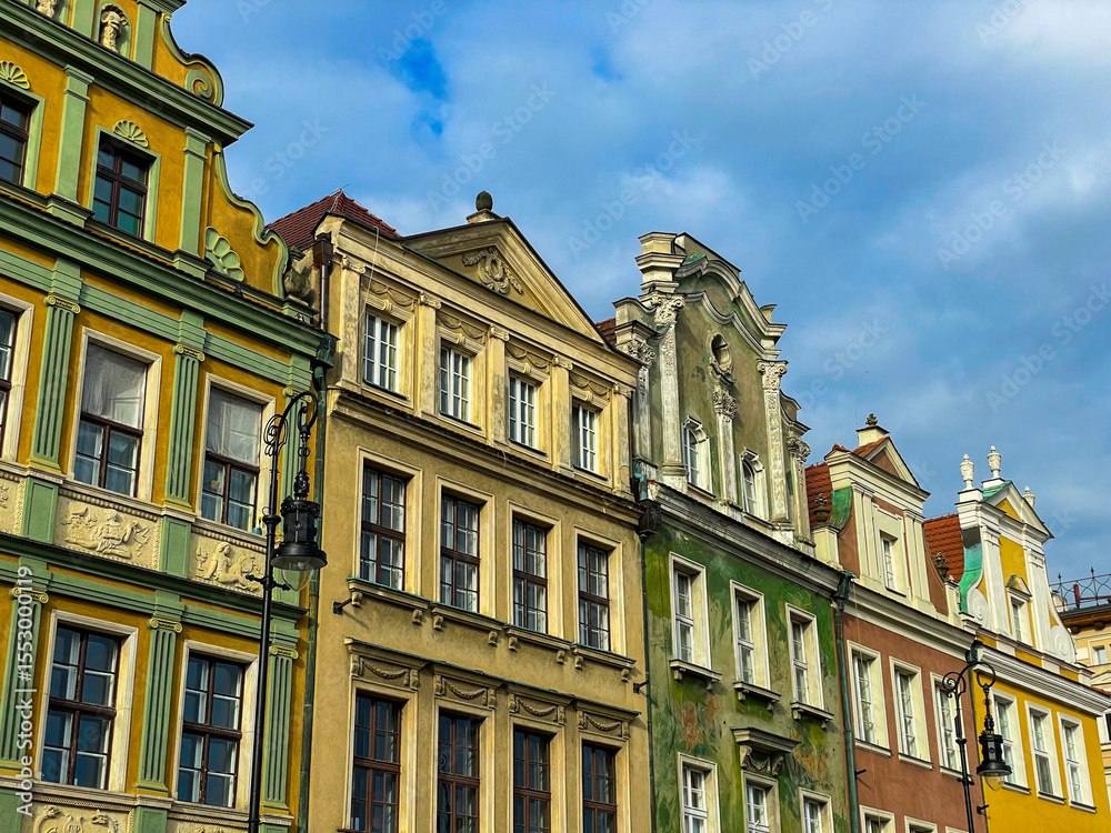 Naklejka premium A beautiful example of Polish Renaissance and Baroque architecture, with richly decorated facades and arched arcades. Popular tourist destination and cultural heritage site in Central Europe.