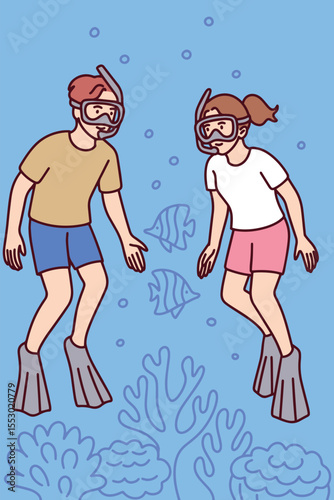 Couple swims underwater wearing masks and fins, exploring coral reef and marine animals. Joyful ocean adventure during summer vacation