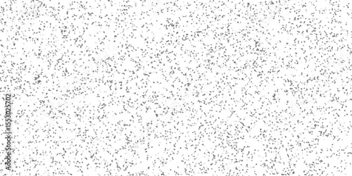 Abstract grayscale mosaic pattern with a random distribution of small irregular shapes across a white background suitable for varied design uses.