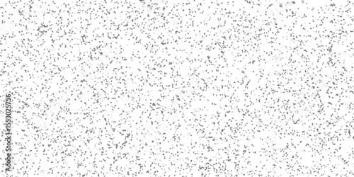 Abstract grey speckled background design with randomly scattered textured elements suitable for various creative applications