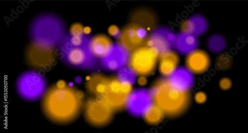 Multicolor blurred circles on dark backdrop. Bright glowing particles form warm atmospheric visual effect.