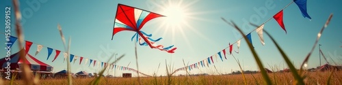 Colorful kite flying at vibrant outdoor festival on a sunny day photo