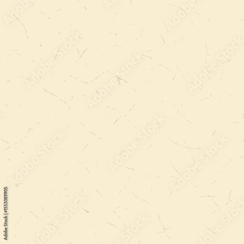Handmade ecru paper background with subtle fleck texture detail