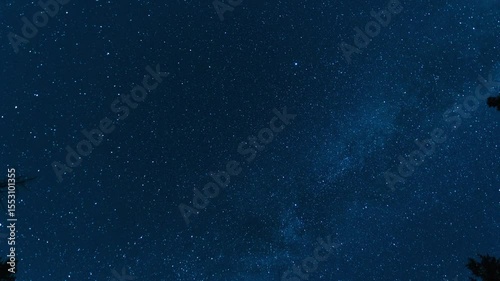 Stars rotating as sky lightens from moonrise 