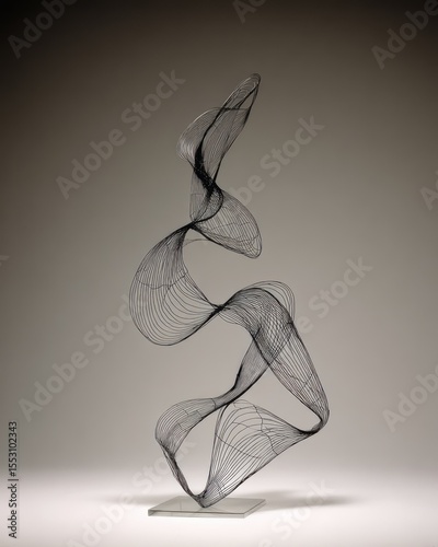 Abstract metal sculpture with flowing lines.
