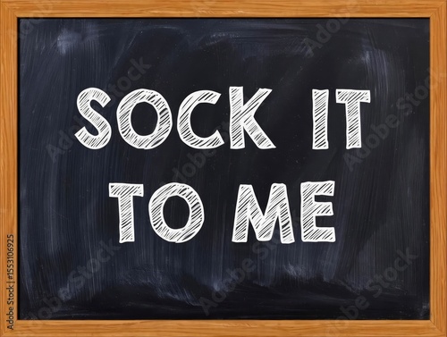 SOCK IT TO ME handwritten text on black chalkboard.