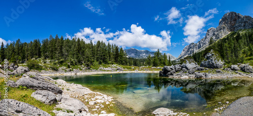 Double Lake (Dvojno jezero) in the Triglav Lakes Valley is surrounded by high mountains - the road to Triglav