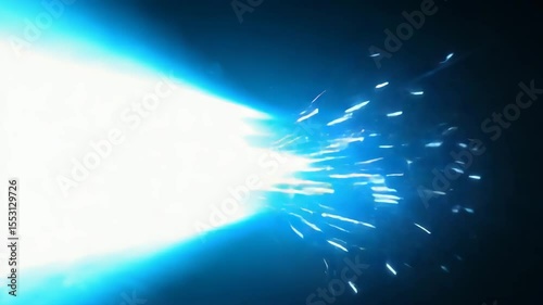 Bright blue light beam shooting through dark space showcasing dynamic energy effects during a cinematic moment
