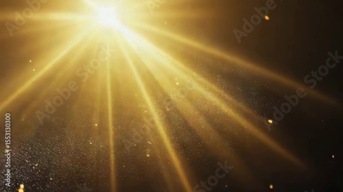 Bright golden rays illuminate a dark space creating a magical atmosphere filled with shimmering particles
