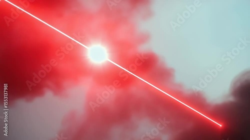 Laser beam pierces through clouds during an atmospheric experiment at sunset in a remote location