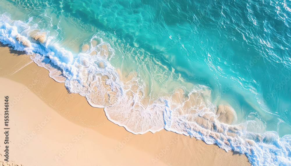 Obraz premium Gentle beach scene with soft blue waves lapping at sandy shore under tranquil golden hour lighting