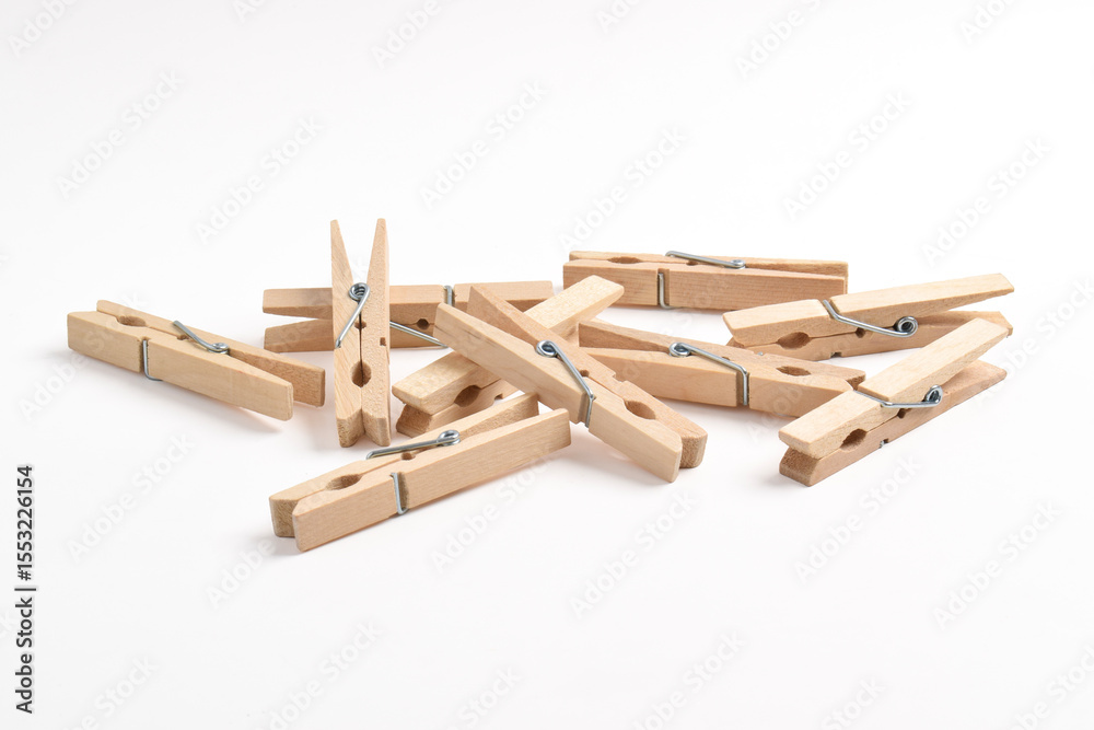 Pile of Wooden clothes pin isolated on white background Pile of Wooden clothes pin isolated on white background