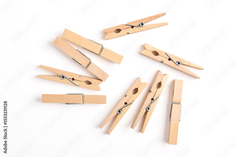 Wooden clothes pin isolated on white background. Top view, flat lay Wooden clothes pin isolated on white background. Top view, flat lay
