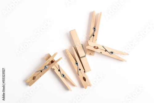 Quadro su tela Wooden clothes pin isolated on white background