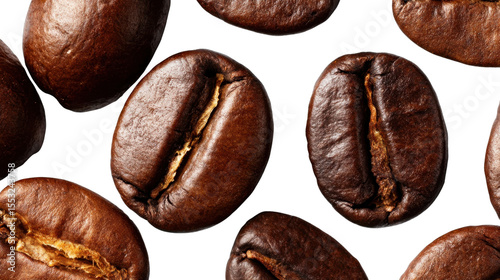 Roasted Coffee Beans: Close-up shot of aromatic roasted coffee beans, showcasing their rich, dark brown color and intricate surface details.  