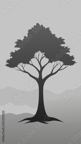 Silhouette of a solitary tree with spreading branches against a muted gray background