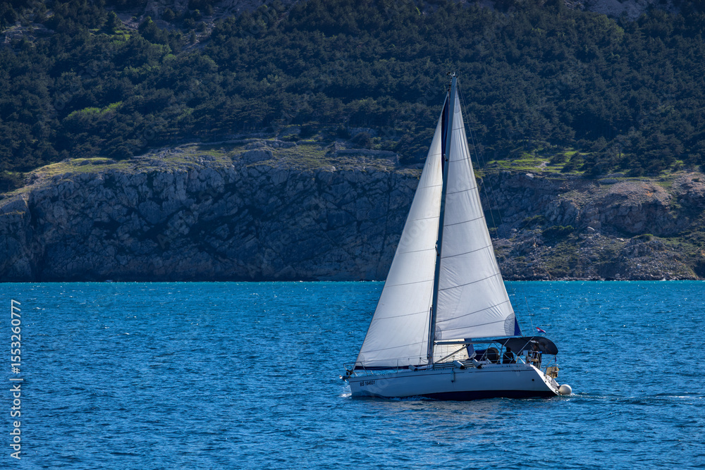 Obraz premium Sailing on the Adriatic Sea in the bay near Baska on the island of KRK in Croatia, water sports,