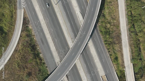 Drone footage aerial view Aerial view of the rural highway with a cross bridge 
